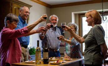 Group of residents enjoying a glass of wine