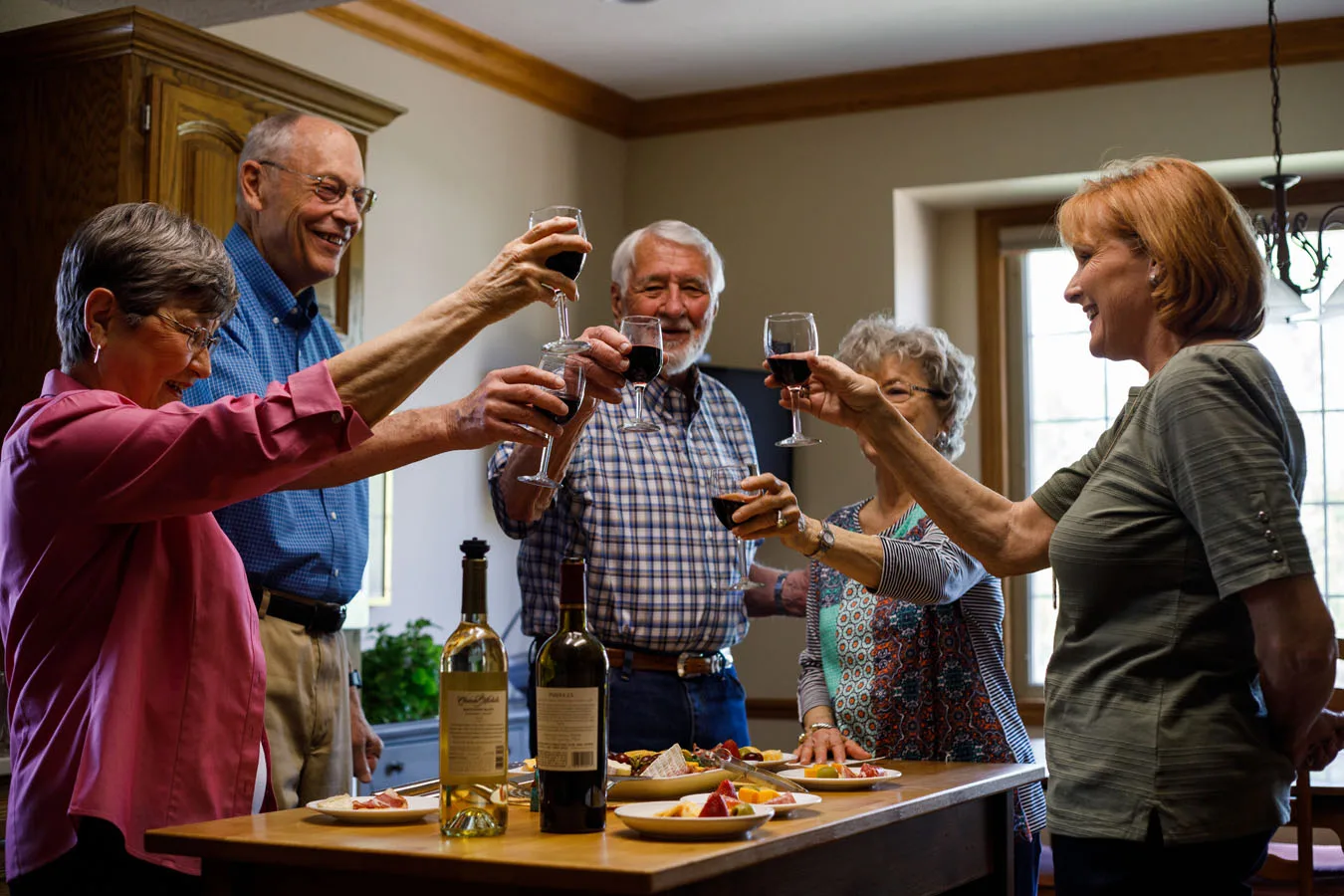Group of residents enjoying a glass of wine