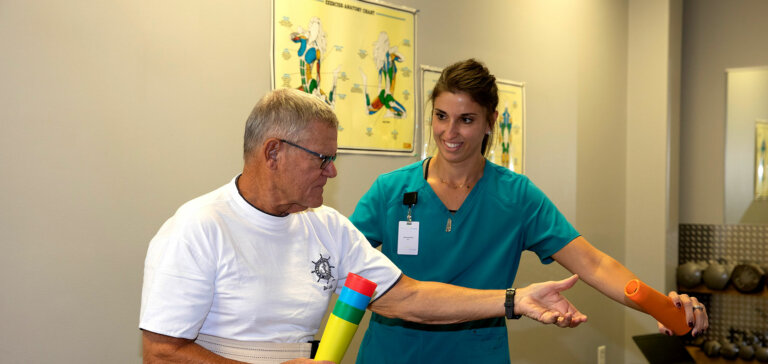 Nurse providing rehab services in transitional care