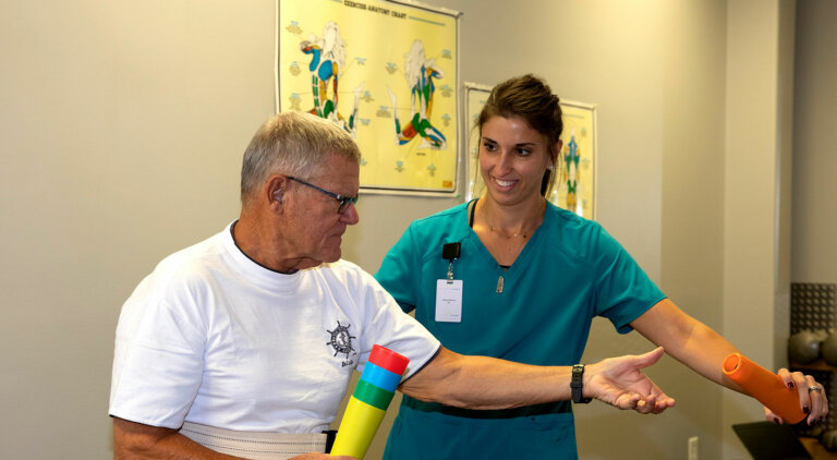 Nurse providing rehab services in transitional care