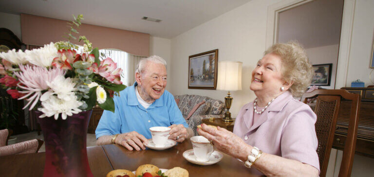 Independent Living Residents Enjoying Tea In Living Room