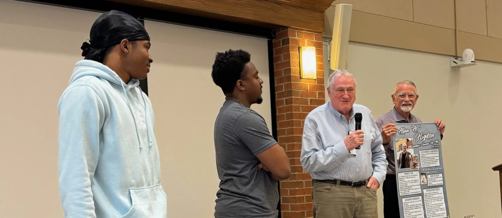 Man giving speech on stage