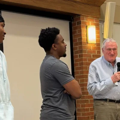 Man giving speech on stage