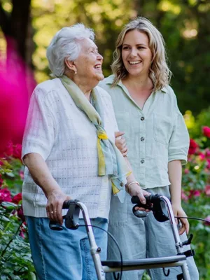 Women out for walk among flowers