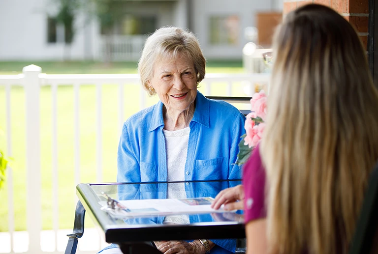 Women at a glass desk